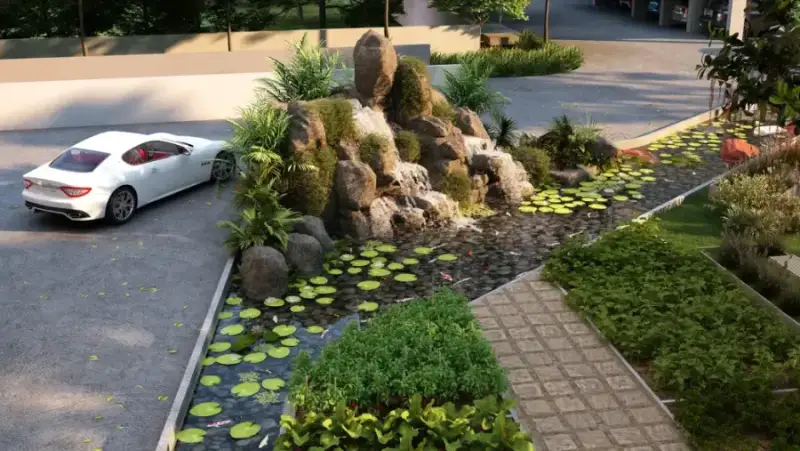 Koi pond water feature in Lake Echo Gardens at Suraksha Whispering Waves, Begur Koi pond water feature in Lake Echo Gardens at Suraksha Whispering Waves, Begur
